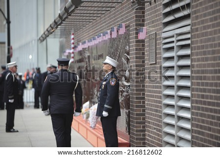 NEW YORK CITY - SEPTEMBER 11 2013: the 13th anniversary of the WTC terror attacks was observed in Lower Manhattan by first responders & relatives of attack victims. Changing of the FDNY honor guard
