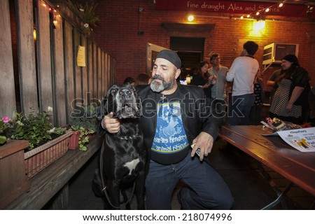 NEW YORK CITY - SEPTEMBER 17 2014: Park Slope for Pets, a non-profit Brooklyn rescue, staged its first annual End of Summer Pawty at the dog-friendly put, The Gate, in Park Slope, Brooklyn.
