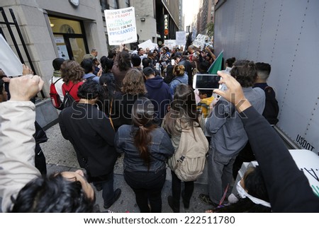 NEW YORK CITY - OCTOBER 8 2014: activists protested in front of the Mexican consulate demanding the Mexican government account for the kidnapping and murder of 43 students from the Ayotzinpapa school