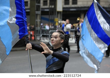 NEW YORK CITY - OCTOBER 13 2014: the 70th annual Columbus Day parade filled Fifth Avenue with thousands of marchers celebrating the pride of Italian heritage. High school drill tream