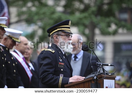 NEW YORK CITY - NOVEMBER 11 2014: 95th annual Veteran\'s Day parade along Fifth Avenue is the largest Nov 11 celebration in the United States.US Army Chaplain Rabbi David Goldstein offers benediction