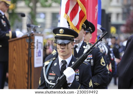 NEW YORK CITY - NOVEMBER 11 2014: the 95th annual Veteran\'s Day parade along Fifth Avenue is the largest Nov 11 celebration in the United States. Color guard