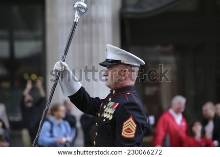 NEW YORK CITY - NOVEMBER 11 2014: the 95th annual Veteran\'s Day parade along Fifth Avenue is the largest Nov 11 celebration in the United States. US Marine Corps marching band drum major