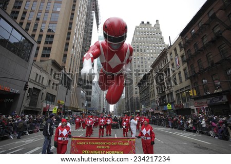 NEW YORK CITY - NOVEMBER 27 2014: the 88th annual Macy\'s Thanksgiving Day parade stretched from Manhattan\'s Upper West Side to Herald Square, viewed by 350,000 spectators. Mighty Morphin Power Ranger