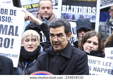 NEW YORK CITY - DECEMBER 2 2014: New Yorkers for Clean & Safe Streets held a press conference by City Hall in praise of Mayor De Blasio\'s plan to ban horse-drawn carriages.NYCC member Ydinis Rodriguez