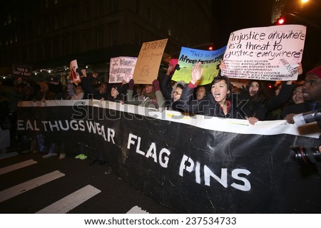 NEW YORK CITY - DECEMBER 13 2014: thousands filled the streets of Lower Manhattan in the Million March NYC to protest police brutality & the lack of organizational accountability.