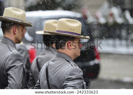 NEW YORK CITY - JANUARY 6 2015: funeral services were held for former New York governor Mario Cuomo at St. Ignatius Loyola Church on Manhattan\'s Upper East Side. New York State troopers at attention
