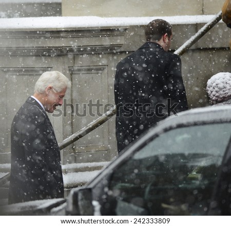 NEW YORK CITY - JANUARY 6 2015: funeral services were held for former New York governor Mario Cuomo at St. Ignatius Loyola Church on Manhattan\'s Upper East Side. Former president Bill Clinton arrives