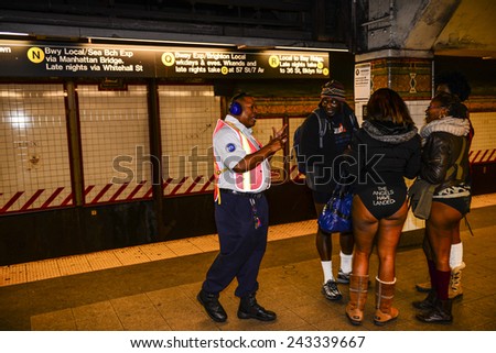 NEW YORK CITY - JANUARY 11 2015: Improv Everywhere staged its 14th annual No Pants Subway Ride bringing several hundred \