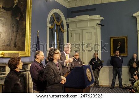NEW YORK CITY - JANUARY 27 2015: Mayor Bill De Blasio joined with several of municipal commissioners for a press conference at City Hall updating on aftermath of winter storm Juno. Conference starts
