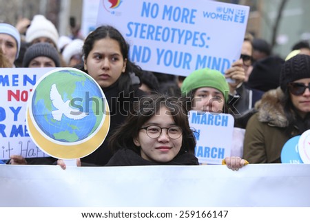 NEW YORK CITY - MARCH 8 2015: United Nations International Women\'s Day was marked with a rally in Dag Hammarskjold Plaza & march to Times Square.