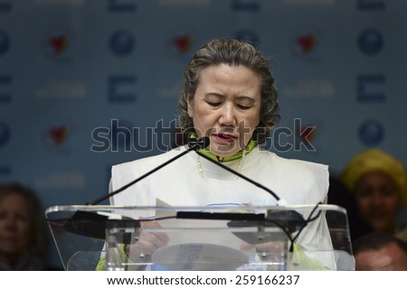 NEW YORK CITY - MARCH 8 2015: United Nations International Women\'s Day was marked with a rally in Dag Hammarskjold Plaza & march to Times Square. Mrs. Yoo Soon-taek, wife of UN Secretary General