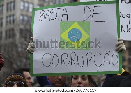 NEW YORK CITY - MARCH 15 2015: Brazilian expatriates & their supporters gathered in Union Square in solidarity with their compatriots protesting the corruption of president Dilma Rousseff\'s government