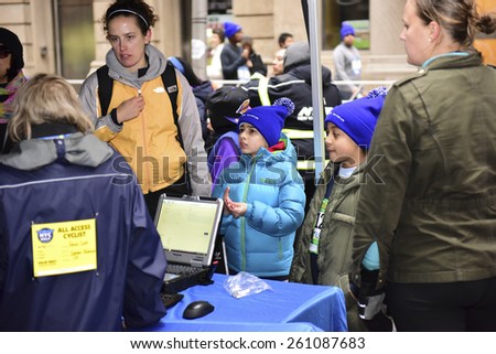 NEW YORK CITY - MARCH 15 2015: the New York Road Runners held their first ever Times Square Kids\' Run a 1500 meter run coinciding with the NYRR annual Half Marathon on Seventh Avenue