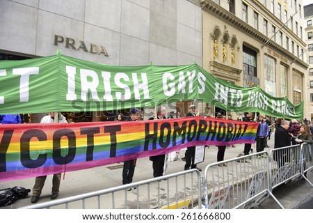 NEW YORK CITY - MARCH 17 2015: the 254th St. Patrick\'s Day parade, led by grand marshal Timothy Cardinal Dolan, filled Fifth Avenue in Midtown in spite of protests from the Irish Queers organization