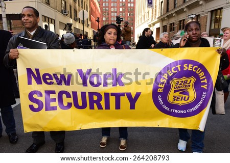 NEW YORK CITY - MARCH 25 2015: the 104th anniversary of the Triangle Shirtwaist Factory fire which killed 146 workers in 1911 was observed by the factory\'s former site.