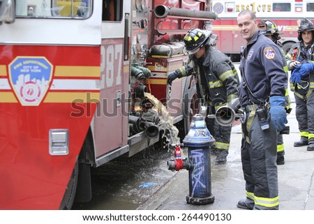 NEW YORK CITY - MARCH 27 2015: one day after a fire & explosion in Manhattan's East Village, two people remain missing while emergency personnel clear the wreckage of three destroyed brownstones