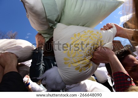 NEW YORK CITY - APRIL 4 2015: the 7th annual International Pillow Fight Day, held on the first Saturday of April, took place in Washington Square Park