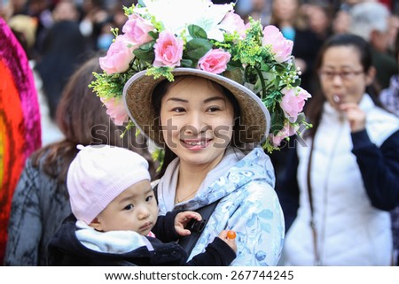 NEW YORK CITY - APRIL 5 2015: thousands of New Yorkers filled 5th Avenue marking Easter Sunday with the tradition Easter Bonnet Parade, a tradition dating from the 1870s