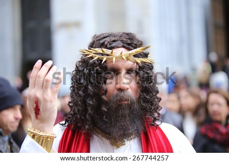 NEW YORK CITY - APRIL 5 2015: thousands of New Yorkers filled 5th Avenue marking Easter Sunday with the tradition Easter Bonnet Parade, a tradition dating from the 1870s. Jesus costume & stigmata