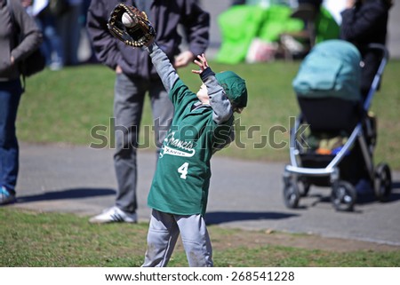 NEW YORK CITY - APRIL 11 2015: the Park Slope Baseball Association & Prospect Park Alliance marked opening day of little league in Prospect Park with Mayor Bill de Blasio & other officials on hand.