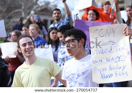 NEW YORK CITY - APRIL 15 2015: students, adjuncts & union representatives gathered at Columbia University for a rally & march to an UWS McDonald\'s demanding a $15 per hour federal minimum wage.