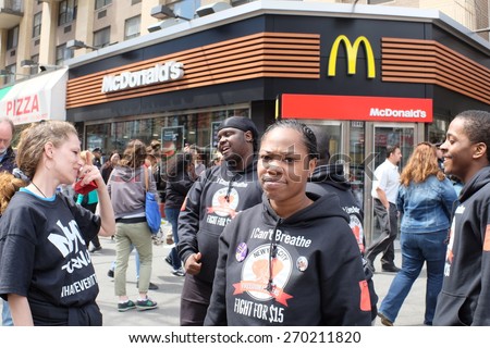 NEW YORK CITY - APRIL 15 2015: high school students, union activists & fast food workers marched in Manhattan's Upper West Side to demand a $15 per hour federal minimum wage.