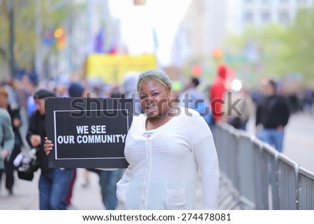 NEW YORK CITY - MAY 1 2015: more than one thousand marched from Union Square Park to Foley Square in celebration of International Workers' Day & continue to demand accountability for law enforcement