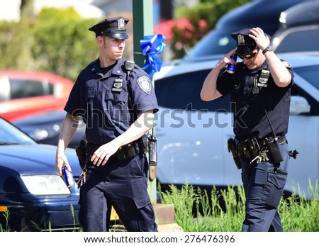 BETHPAGE, LONG ISLAND - MAY 7 2015: police officers from all over North America converged on Chapey & Sons Funeral Home in Bethpage to pay respects to slain NYPD officer Brian Moore.