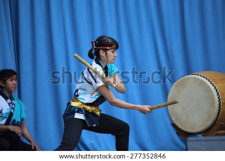 NEW YORK CITY - MAY 10 2015: the ninth annual Japan Day was observed in Central Park with demonstrations of swordsmanship, kabuki face painting, folk dances, Japanese foods, costumes & music