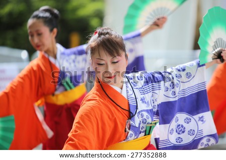 NEW YORK CITY - MAY 10 2015: the ninth annual Japan Day was observed in Central Park with demonstrations of swordsmanship, kabuki face painting, folk dances, Japanese foods, costumes & music