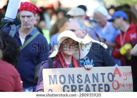 NEW YORK CITY - MAY 23 2015: environmental activists joined a global day out against Monsanto\'s GMO programs & demanding that foods be labeled.