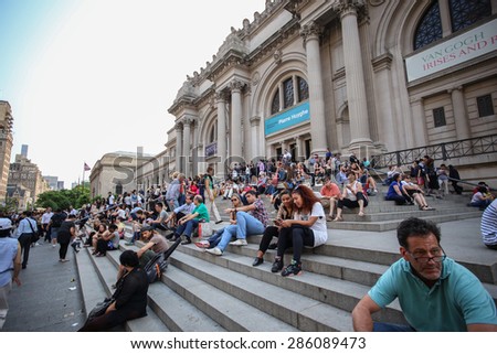 NEW YORK CITY - JUNE 9 2015: the 37th annual Museum Mile festival opened Fifth Avenue\'s Museum Mile to pedestrians and permitted visitors to enter museums free of charge. People outside Metropolitan Museum
