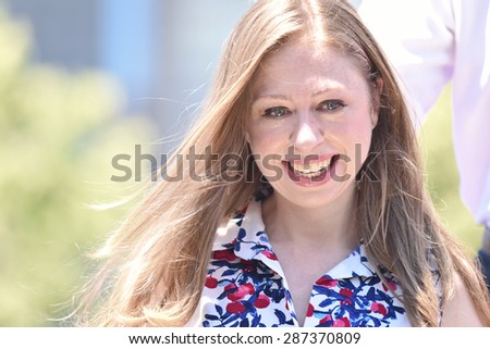 NEW YORK CITY - JUNE 13 2015: Chelsea Clinton supports her mother and former secretary of state Hillary Rodham Clinton as she formally announces her intention to seek the 2016 Democratic nomination for president during a rally on Roosevelt Island