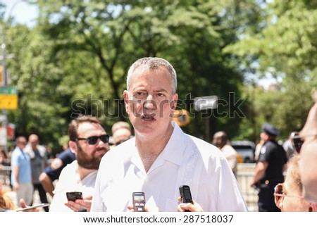 NEW YORK CITY - JUNE 14 2015: NYC mayor Bill de Blasio held a press conference at the end of the Puerto Rico Day parade to call on Albany lawmakers to reach agreement on continuing rent stabilization