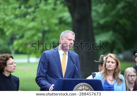 NEW YORK CITY - JUNE 18 2015: Mayor Bill de Blasio held a press conference in Prospect Park, attended by city officials, to announce the  restriction of vehicular traffic in Prospect & Central Parks
