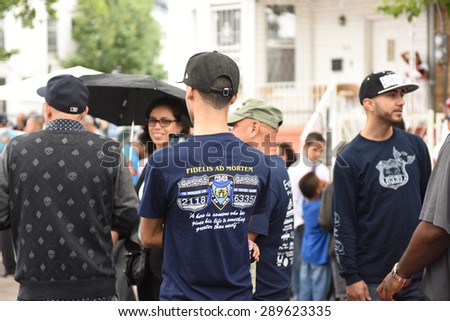 NEW YORK CITY - JUNE 20 2015: Bill de Blasio, commissioner William Bratton & members of Rafael Ramos\'s family attended a ceremony renaming a street in Cypress Hill after the slain NYPD detective
