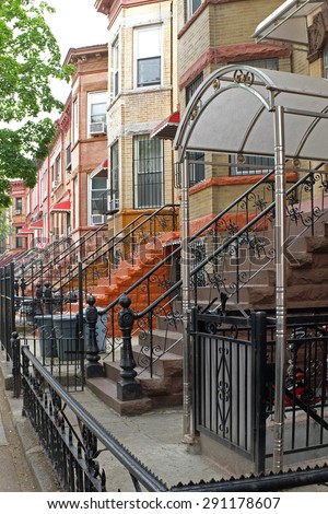 Brownstone Brooklyn series/view of Brooklyn neighborhood, brownstone homes with stairs & various types of railings