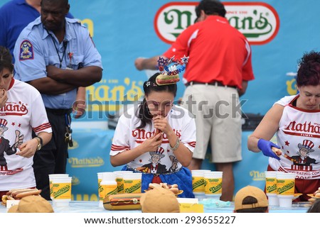 NEW YORK CITY - JULY 4 2015: Nathan\'s Famous staged its annual fourth of July hot dog eating contest in Coney Island, Brooklyn. Women\'s division competitors