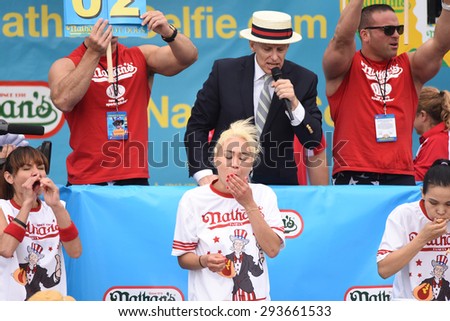 NEW YORK CITY - JULY 4 2015: Nathan\'s Famous staged its annual fourth of July hot dog eating contest in Coney Island, Brooklyn. Miki Sudo, Michelle Lesco & Sonya Thomas compete in the women\'s division