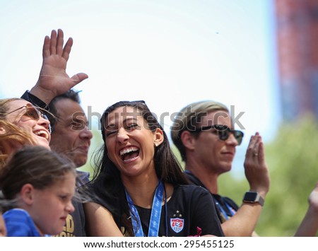 NEW YORK CITY - JULY 11 2015: a ticker tape parade was held for the champion US women\'s FIFA team along Canyon of Heroes on Broadway. Christen Press & Amy Wambach ride float