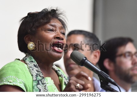 NEW YORK CITY - JULY 12 2015: organized labor, fast food workers & elected officials gathered on Barclay St. to celebrate the NY wage board's recommendation for a $15/hr minimum wage statewide by 2021
