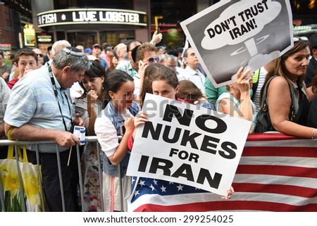 NEW YORK CITY - JULY 22 2015: thousands rallied in Times Square to oppose the President\'s proposed nuclear deal with Iran. Rally attendees with anti-Iran signs