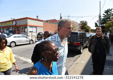 NEW YORK CITY - AUGUST 29 2015: Mayor Bill de Blasio and NYC first lady Chirlane McCray visited hair salons in Brooklyn to encourage patrons to sign their children up for Pre-K
