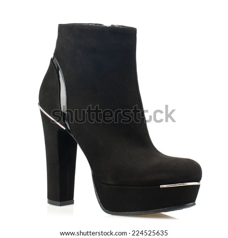 Black suede high boot women shoe isolated on white background.