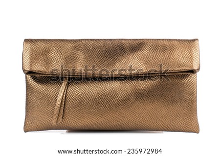 Gold clutch isolated on white background.