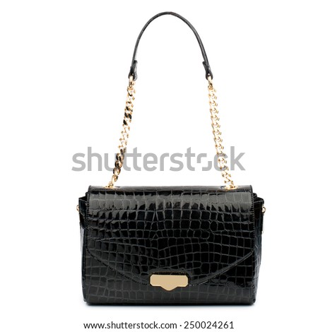 Black patent clutch isolated on white background.