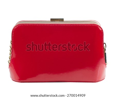 Red patent clutch isolated on white background.