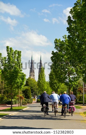 RHEINE - MAY 10th, 2013: Group of men cycling in the area of Rheine, Germany, on a spring day on May 10th, 2013. This area is a popular touristic destination to ride bicycles