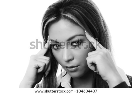 woman with her finger tips up to the temple of her head as if she is thinking something